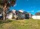 Charming single-story home with lush front lawn and well-maintained landscaping at 2609 Summer Creek Dr, Kissimmee, FL 34747