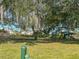 Community park featuring playground and mature shade trees at 2609 Summer Creek Dr, Kissimmee, FL 34747