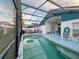 Enjoy this covered outdoor pool and patio area at 2609 Summer Creek Dr, Kissimmee, FL 34747