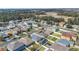 Aerial shot of a residential neighborhood with well-kept homes, landscaping, and community pool at 2783 Trommel Way, Sanford, FL 32771
