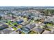 Aerial view of the neighborhood shows houses with fenced yards and pools at 2783 Trommel Way, Sanford, FL 32771