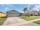 Charming single-Gathering home with well-maintained lawn and two car garage at 2783 Trommel Way, Sanford, FL 32771