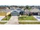 Charming single-story home with well-manicured lawn, mature landscaping, and attached garage at 2783 Trommel Way, Sanford, FL 32771