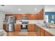 Modern kitchen with stainless steel appliances and sleek countertops at 2783 Trommel Way, Sanford, FL 32771