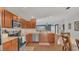 Well-equipped kitchen with stainless steel appliances and ample counter space at 2783 Trommel Way, Sanford, FL 32771