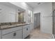 Modern bathroom boasting granite vanity and double sinks at 2896 Lingo Ln, Orlando, FL 32822