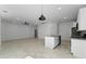 Open floor plan with kitchen and living room at 2896 Lingo Ln, Orlando, FL 32822