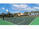 Outdoor basketball court with two hoops at 3071 Beach Palm Ave, Kissimmee, FL 34747