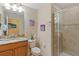 Bathroom with granite vanity, shower, and Frozen theme at 3071 Beach Palm Ave, Kissimmee, FL 34747