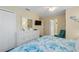 Bedroom with king-size bed, dresser, and TV at 3071 Beach Palm Ave, Kissimmee, FL 34747