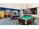 Fun game room with pool tables and arcade games at 3071 Beach Palm Ave, Kissimmee, FL 34747