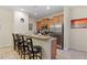 Kitchen with stainless steel appliances and an island at 3071 Beach Palm Ave, Kissimmee, FL 34747