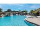 Large resort-style pool with waterfall features at 3071 Beach Palm Ave, Kissimmee, FL 34747