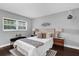 Serene bedroom with wood floors, natural light and neutral decor at 3104 Harrison Ave # 11, Orlando, FL 32804