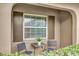 Cozy porch featuring a seating area and shade from the bright sun at 3104 Harrison Ave # 11, Orlando, FL 32804
