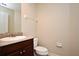 Small bathroom with toilet and granite countertop at 4220 Messina Dr, Lake Mary, FL 32746