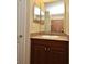 Vanity with granite countertop and double mirrors at 4220 Messina Dr, Lake Mary, FL 32746