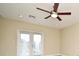 Bedroom with ceiling fan and access to a private balcony at 4220 Messina Dr, Lake Mary, FL 32746