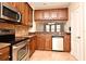 Kitchen with stainless steel appliances and wood cabinets at 4220 Messina Dr, Lake Mary, FL 32746