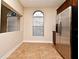 Kitchen breakfast nook with tile floors and stainless steel refrigerator at 4220 Messina Dr, Lake Mary, FL 32746