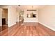 Hardwood floor living room, view of kitchen and bathroom at 4220 Messina Dr, Lake Mary, FL 32746