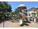 Community playground with spiral slide at 4220 Messina Dr, Lake Mary, FL 32746