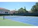 Well-maintained tennis court with green surface and net at 4220 Messina Dr, Lake Mary, FL 32746