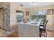 Quartz kitchen island with seating for four, overlooking the backyard at 426 Vista Loop, Davenport, FL 33897