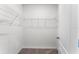 Empty walk-in closet with wire shelving and hanging rod at 5539 Hayloft Dr, Apopka, FL 32712