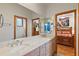 Double vanity bathroom with access to bedroom at 5800 N Dean Rd, Orlando, FL 32817