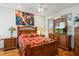Bedroom with wooden furniture and hardwood floors at 5800 N Dean Rd, Orlando, FL 32817