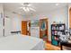 King bedroom with ensuite bathroom and hardwood floors at 5800 N Dean Rd, Orlando, FL 32817