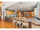 Large kitchen with island, granite countertops, and stainless steel appliances at 5800 N Dean Rd, Orlando, FL 32817
