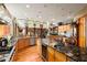 Open kitchen with large island and breakfast bar at 5800 N Dean Rd, Orlando, FL 32817