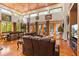 Large living room with high ceilings, hardwood floors and access to the pool at 5800 N Dean Rd, Orlando, FL 32817