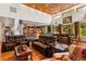 Open concept living room with kitchen and hardwood floors at 5800 N Dean Rd, Orlando, FL 32817