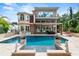 Stunning pool and spa area with a beautiful home view at 5800 N Dean Rd, Orlando, FL 32817