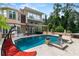 Resort-style pool and spa with expansive patio at 5800 N Dean Rd, Orlando, FL 32817