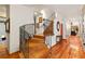Elegant wooden staircase with wrought iron railings at 5800 N Dean Rd, Orlando, FL 32817