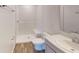 Modern bathroom with walk-in shower and gray vanity at 590 E Division W St, Deland, FL 32724