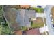 Bird's-eye view of the home highlighting the roof, backyard, and surrounding neighborhood at 605 Marni Dr, Winter Springs, FL 32708