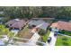 Aerial view of a charming home with a spacious backyard and nearby trees at 605 Marni Dr, Winter Springs, FL 32708