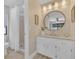 Bathroom featuring updated vanity with granite countertops and updated shower at 605 Marni Dr, Winter Springs, FL 32708