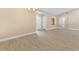 Well lit dining area featuring tile flooring, neutral paint, and a decorative light fixture at 605 Marni Dr, Winter Springs, FL 32708