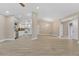 Open-concept living space featuring new floors, neutral paint, a modern kitchen, and a large dining area at 605 Marni Dr, Winter Springs, FL 32708