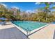 Enjoy a refreshing swim in this community pool with plenty of lounge seating surrounded by mature trees and sunny skies at 605 Marni Dr, Winter Springs, FL 32708