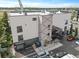 Modern building featuring unique exterior design, including a diamond pattern and convenient surface parking at 62 W Colonial Dr # 302, Orlando, FL 32801