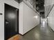 A long hallway with well defined industrial features at 62 W Colonial Dr # 302, Orlando, FL 32801