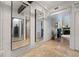 Interior view featuring large mirrors and exposed brick and concrete at 62 W Colonial Dr # 302, Orlando, FL 32801