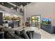 Bright living room with high ceilings, exposed brick, and modern décor at 62 W Colonial Dr # 302, Orlando, FL 32801
